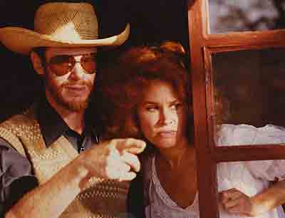 Michael and Karen Black on the set of Grass is Singing